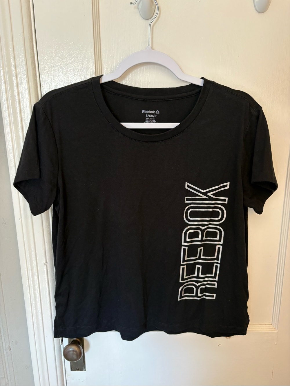 Reebok Black Short Sleeve Tee with Vertical White Logo